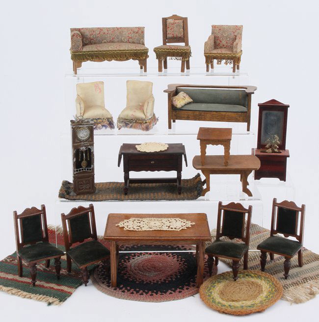 Edison House Furniture Group: dolls' house furniture grouping with dining table and 4 marked upholstereed chairs made in Northern Ireland ("made in Cushendahl"), drop leaf side board, mission style sofa with leathette upholstery,