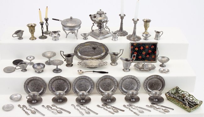 Miniature Pewter Tableware: includes Gerlach tea pot on stand, chafing dish, 2 pairs candlesticks, flatware service for 6 with a few extra pieces, 6 each plates, cups and saucers along with platters, pitchers, compotes, bonbon d