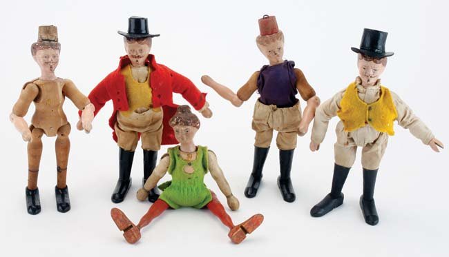 Schoenhut Circus Figures: painted wood jointed figures: 4 ring masters/ lion tamers and a lady acrobat appr. 8.5" t. each