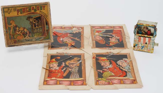 Punch & Judy Bank & Cut Up Puzzle: lithographed tin lever activated coin bank and complete lithographed cut up puzzle in box by Peter G. Thomson, Cincinnati bank 4.5" t.