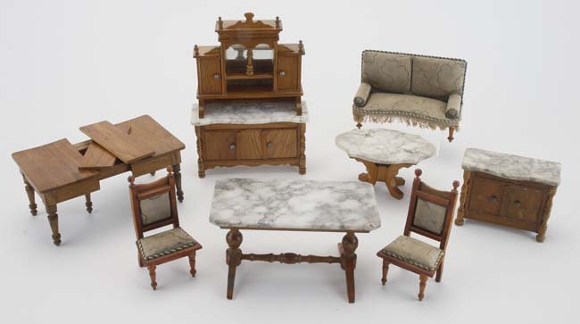 Schneegass Dining & Parlor Furniture: circa late 1800's, golden oak toned stained wood dolls' house furniture includes larger expanding dining table retaining perfectly matched leafs (1 retaining F.A.O. Schwarz paper label), marble top br