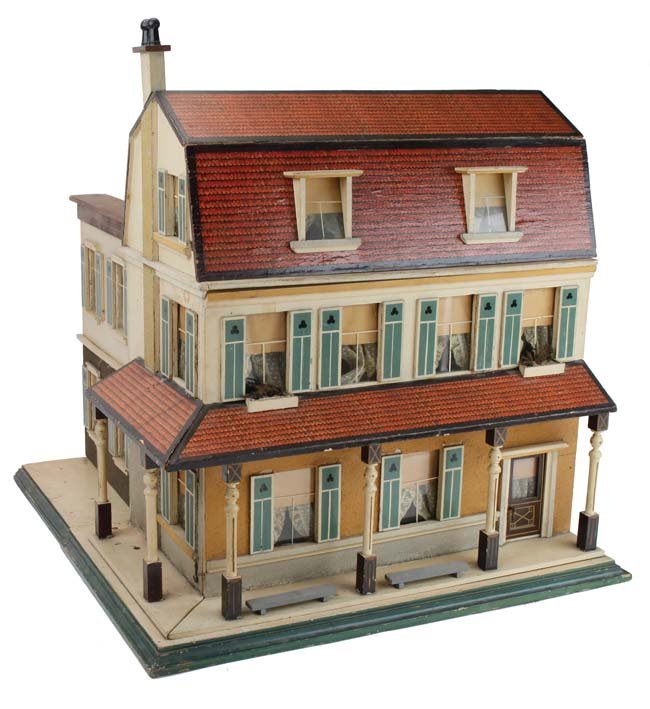 Christian Hacker Furnished Dolls' House: circa 1920's, model 504 (marked on underside as well as Made in Germany ink stamp) painted wood structure with lithographed paper covered roof with front and partial side porch; The opening front pane