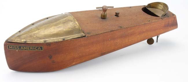 Mengel Playthings Miss America Boat: stained wood with copper construction, internal clockwork mechanism, retains makers decal on stern 15" l.