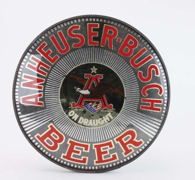 Anheuser - Busch Illuminated Reverse on Glass Sign: reverse on glass circular sign in tin frame with metal corner angled brackets for mounting on square post, interior has mirrored surface for light intensification 18" dia. x 8" d.