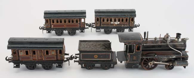 Carette Gauge I Live Steam Passenger Set: American steam profile 2-2-0 live steam loco (cow catcher detached), tender and 3 cars (1 missing a door) e & t - 17" l., cars 8" l.