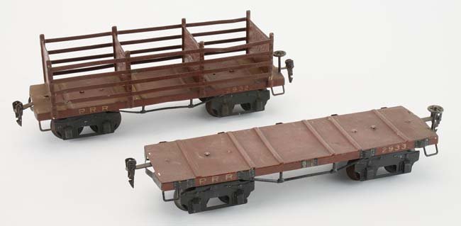 Marklin Gauge I PRR Coke & Lumber Cars: painted tin cars with cast iron wheels, includes slatted side coke car and a flat bed lumber car missing stanchions appr. 11"l. each