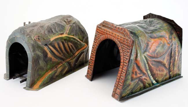 Two Marklin Tunnels: includes lager tunnel has "brick" faced arches while the smaller has "block' arch facing and retains original interior gauge I track section - exterior decorated with a castle, church and bridges and 