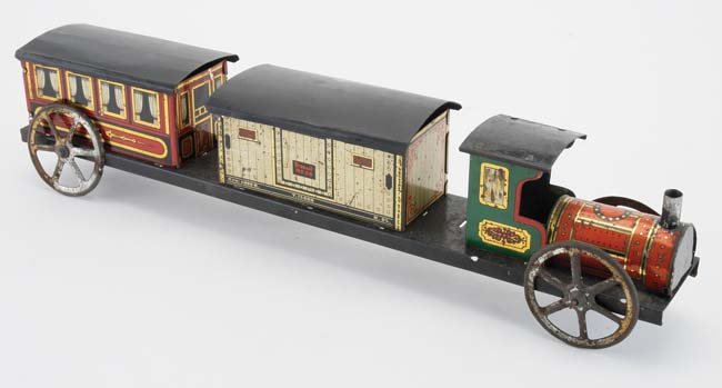 Issmayer Floor Train: unusual Issmayer floor train with loco, box car and passenger coach mounted on 4 wheel tin platform, typical colorful Issmayer lithography 15" l.