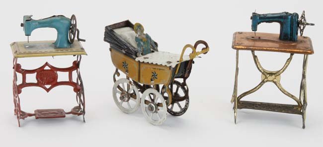 Three Doll's House Penny Toys - Carriage & Sewing: German lithographed and painted tin penny toys machines appr. 3" t.