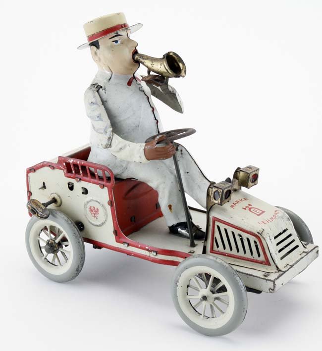Lehmann Tut-Tut: painted and lithographed tin, clockwork, with operating bellows, a classic and popular Lehmann auto in complete and operating condition 7" l.