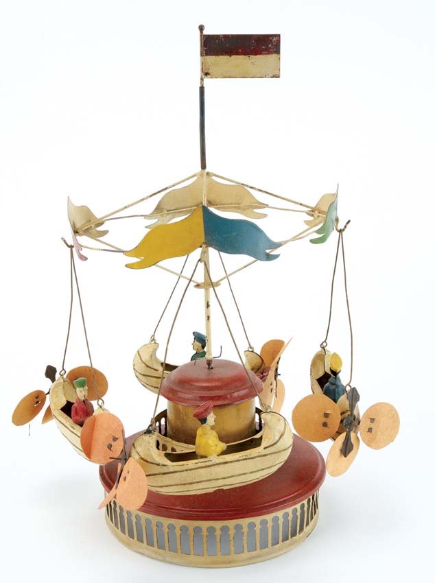 German Flying Boats Fairground Toy: painted tin with clockwork mechanism and paper bladed propellers 14" t.