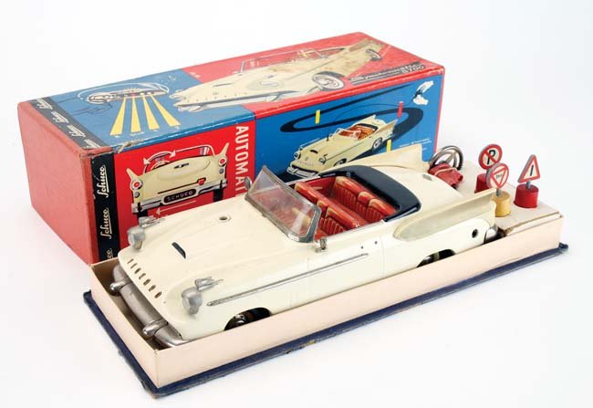Schuco Synchromatic 5700 Packard: plastic and tin battery powered with steering, in original box 13" l.