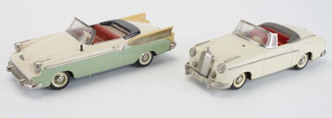 Two Schuco Elektro Cars - 5710 & 5720: both operate with 2 C cell Batteries: Elektro - Radio 5710 with music - drive motor works but not music, Elektro 5720 has clean battery compartment but does not work 11" l.