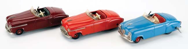 Three Schuco Cars: Combinato & Examico: tin clockwork, including 2 Combinato 4003 with windup horn sound and Examico with operating gear shift 7.5" l.