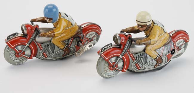 A Pair of Schuco Racing Motorcycles: both US Zone Germany, includes Mirakomoto 1012 racer #4 and Motodril 1006 racer #2 with plastic helmet 5" l.