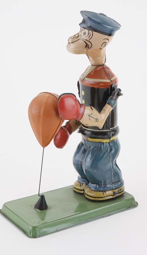 Chein Popeye Punching Bag: great Chein Popeye toy - windup action has the sailor banging away at celluloid punching bag - an exceptional example 7.5" t.