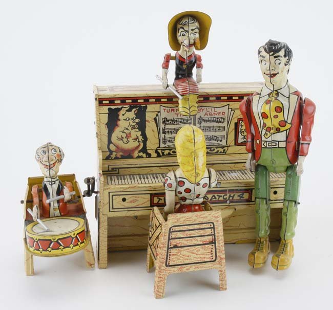 Unique Art Lil Abner Dogpatch Band: lithographed tin clockwork, classic American comic character toy, fully functional with great color 8.5" w.