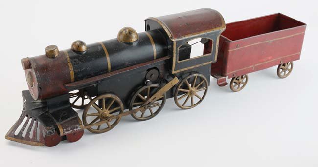 Hillclimber Loco & Tender - Black: painted pressed steel with inertia wheel friction drive, scarcer version with black painted boiler and bell ringing device - bell mounted on cabin roof 25" l.