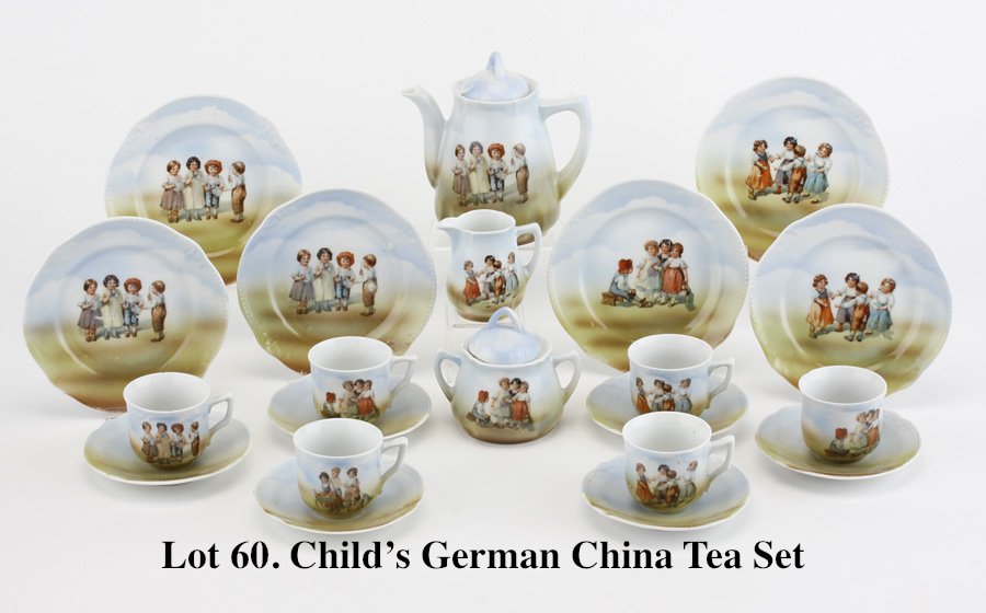 Child's German China Tea Set: very nice complete 23 piece service for 6 includes covered teapot and sugar with creamer, 6 cups and 6 each scalloped edge saucers and plates with charming imagery of children at play; all pieces (exc