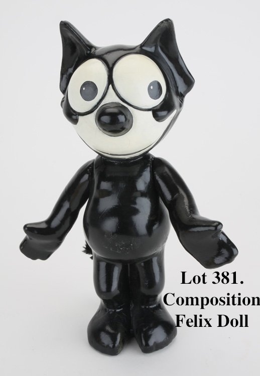 Composition Felix Doll: painted composition doll with posable arms, remnents of paper label on feet, appears to be in amazingly original paint - sometimes hard to tell on hand painted dolls such as this, retains original fur