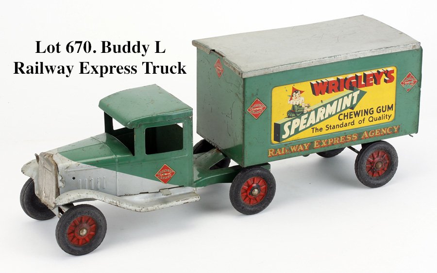 Buddy L Railway Express Truck: pressed steel semi-trailer truck with rubber tired wheels and decorated with Wrigley's Spearmint advertising, a very nice example showing moderate wear 23.5" l.