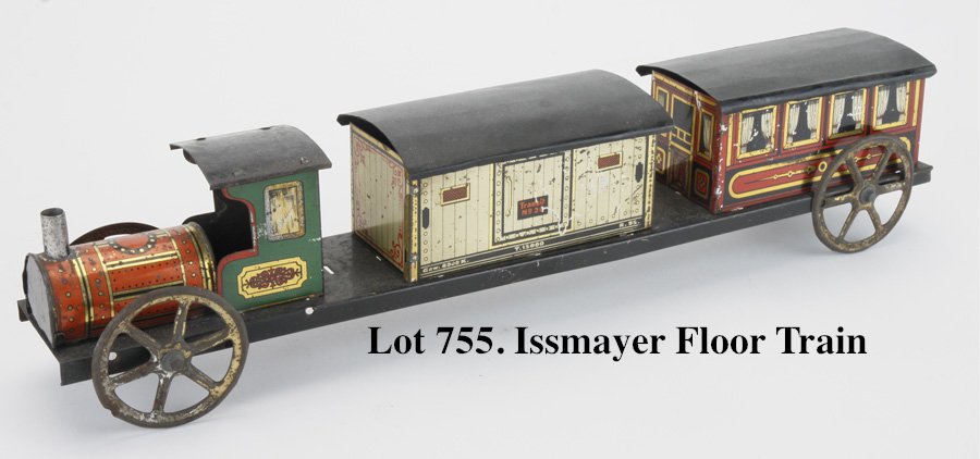 Issmayer Floor Train: unusual Issmayer floor train with loco, box car and passenger coach mounted on 4 wheel tin platform, typical colorful Issmayer lithography 15" l.
