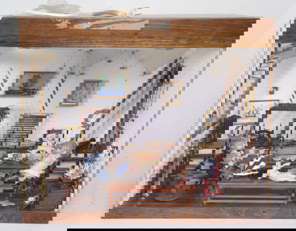 Nautical Theme Room: American, ca. 1970's, designed to represent a yachting salesroom, this custom-made room box features an assortment of nautical item including a whalebone ship's wheel and anchor, seven ship models, br