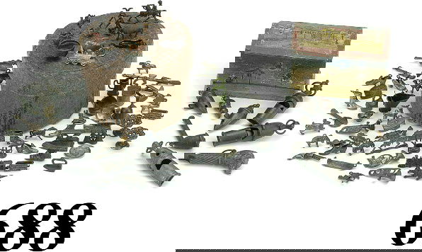 Lot: Whistles & Charms: these were found in the museum toy shop - some of the whistles are figural - dog, pipe, ocarina; along with an amazing variety of metal charms - offered with 2 decorative boxes, various sizes