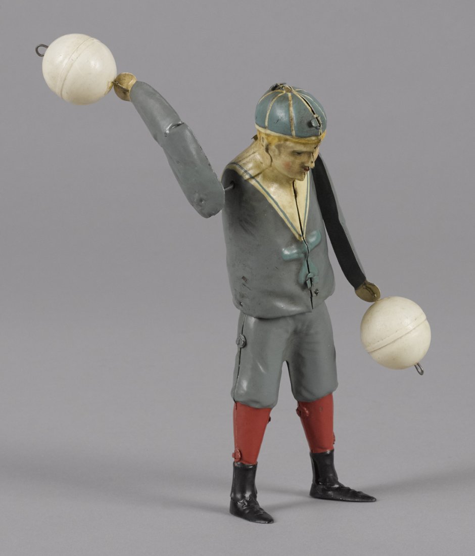 Gunthermann hand painted tin clockwork ball twir (1 of 1)