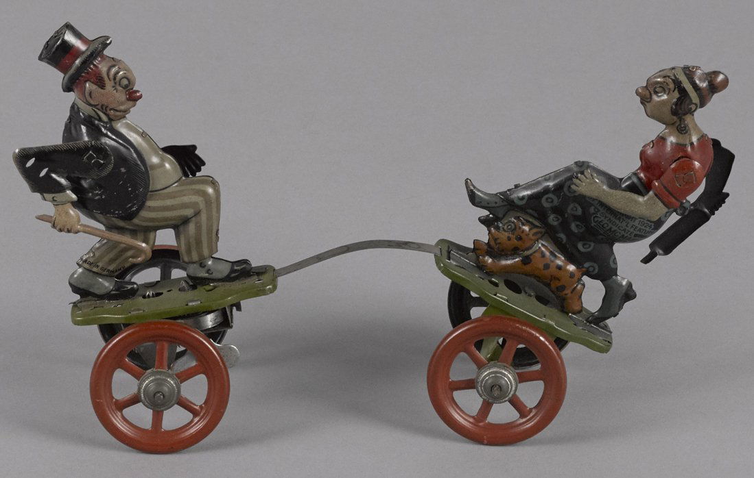 Nifty tin lithograph wind-up Maggie and Jiggs pl (1 of 1)