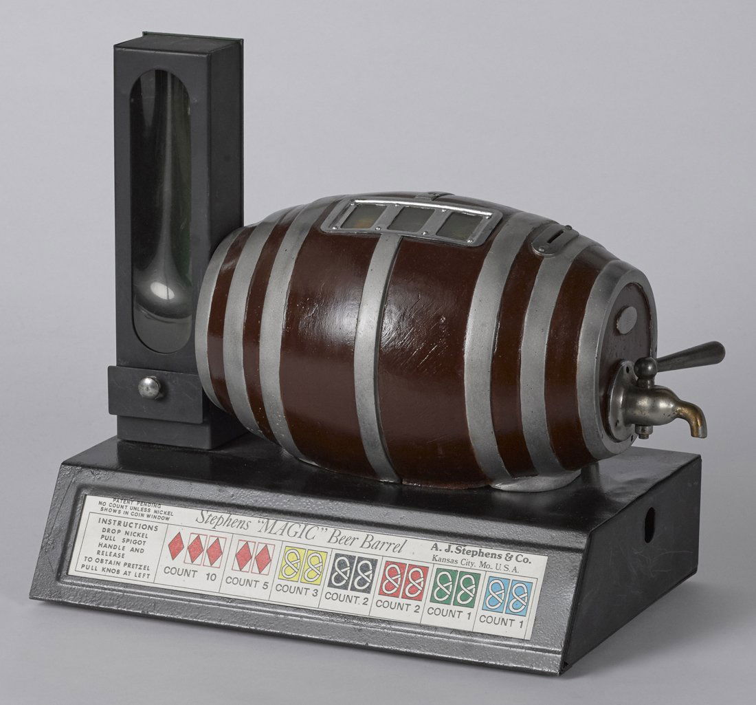 Stephens Magic Beer Barrel coin operated pretz: Stephens Magic Beer Barrel coin operated pretzel vending machine, 11 1/4'' h., 12'' w.