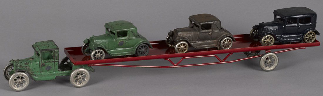 Arcade cast iron flatbed car carrier with three (1 of 1)