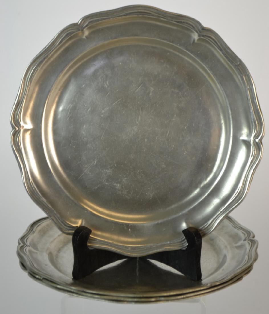 Matched Set of 4 18th Century French Pewter Plates: Matched set of Four 18th century French pewter wavy-edge or â€˜Rococoâ€™ form plates. Ownerâ€™s initials stamped on the back of each rim, circa 1750. D: 9 Â¼â€.