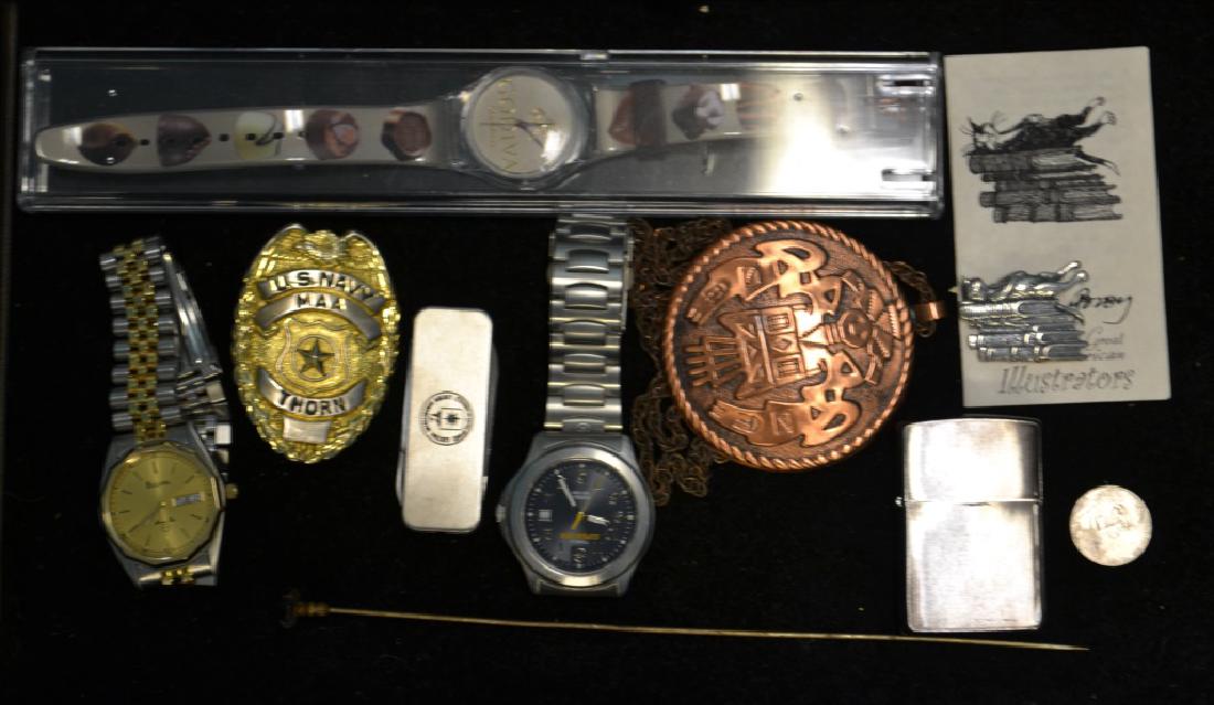 Three Watches & Other Misc. Smalls: Three Watches & Other Misc. Smalls, includes a Bulova two-tone watch, Timex Expedition watch, Godiva Chocolate watch, CIA pocket knife, Zippo lighter, US Navy MAA Thorn badge & copper medallion