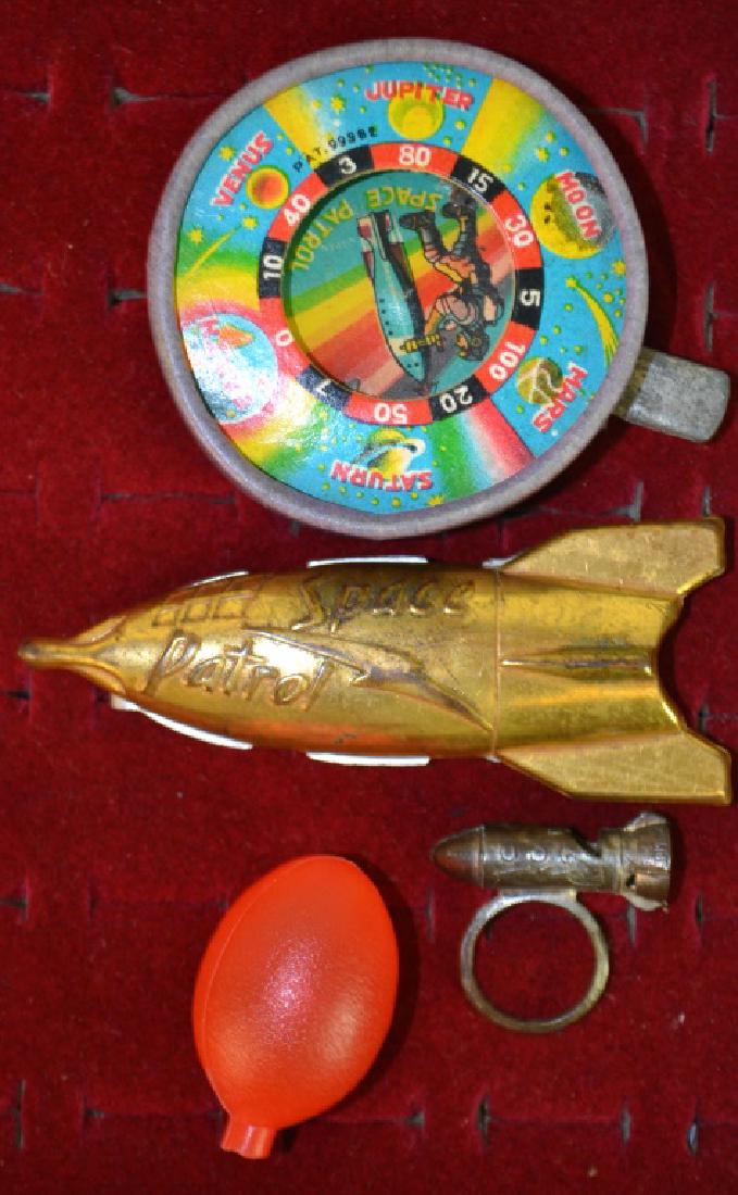 1950's Space Control T.V. Premiums Lot: 1950's Space Control T.V. Premiums including: Brass Rocket Ship decoder belt buckle, spaceship ring and cardboard spinner.