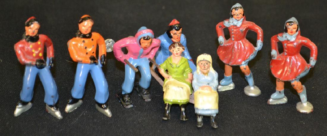 6 Barclay Figure & Others: 6 Barclay Figures and a sled including: 4 figure skaters, 2 English seated female figures on a bench, 1 skier, etc