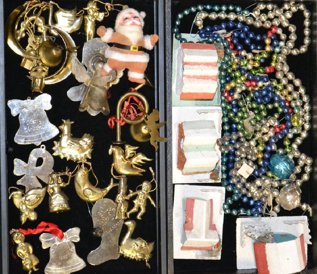 Collection of 1930's & 40's Christmas Ornaments: Collection of 1930's & 40's Christmas Ornaments including: (9) strands of glass hanging beads, pressed metal ornaments, vintage Japanese Santa, (2) early Japanese Christmas balls.