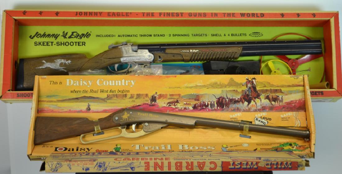 Daisy Country Trail Boss Super Play Rifle & Others: Daisy Country Trail Boss Super Play Rifle, in Original box, Excellent Condition. Being sold with a Johnny Eagle Skeet Shooter (Parts gun, damage to plastic stock, missing some parts, box is in excelle