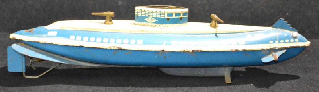 Vintage Tin Litho Baking Soda Submarine: First half 20thC Tin Litho Baking Soda Submarine made by Wolverine Supply and Manufacturing Pittsburg Pa (pre zip code) measuring appx 13"L - retains both cannons, propeller, and base (all intact) - c