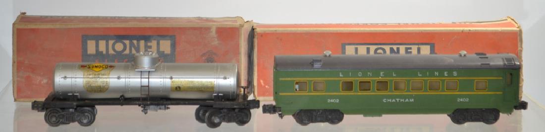 Two Lionel O Gauge Train Cars: Two Lionel O Gauge train cars including #2555 Tank Car Sunoco in good condition with decals intact in original box, the other is #2402 Chatham passenger car in good condition in original box