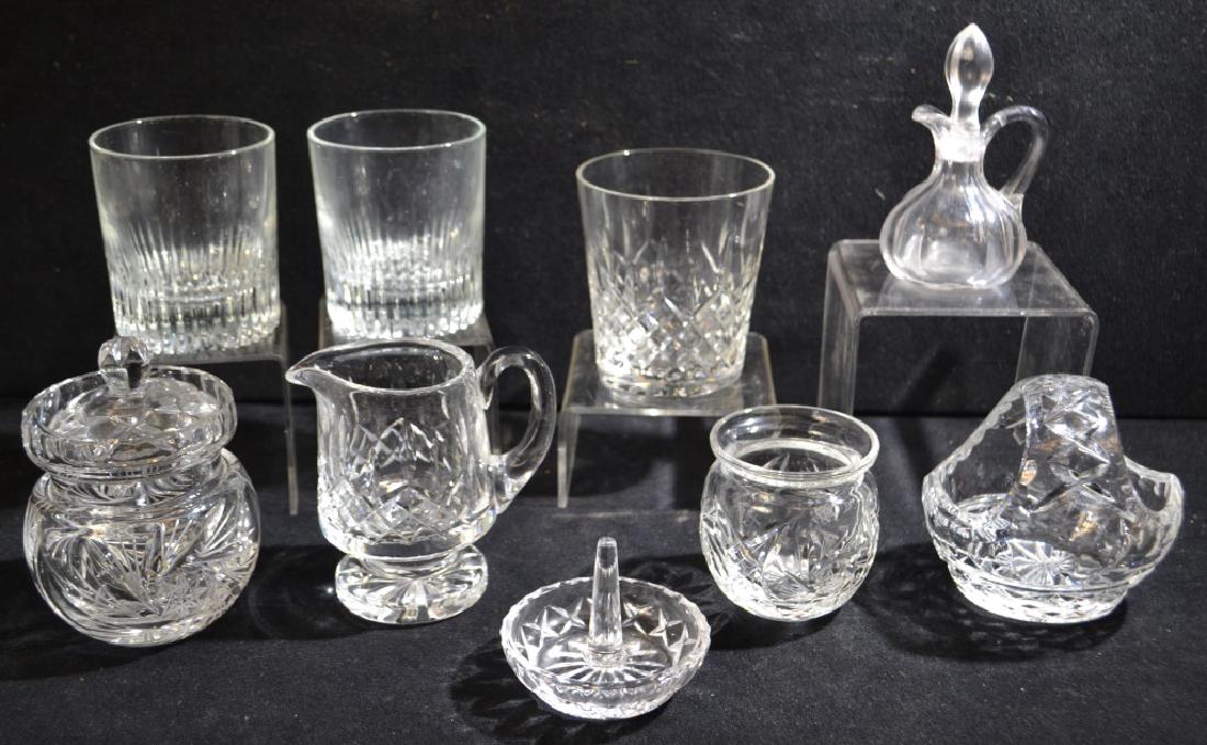 Collection of Nine Crystal and Pressed Glass Items: Crystal and pressed glass items include; three tumblers, a covered sugar and creamer, ring holder and more