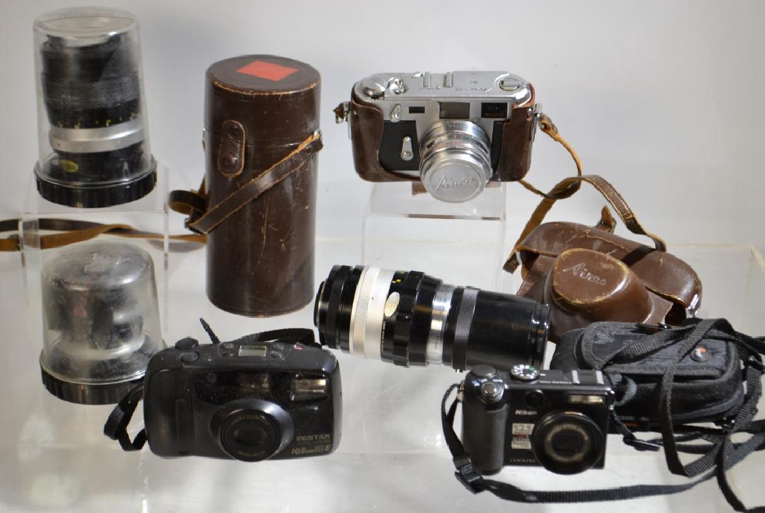 Vintage Camera Grouping: Vintage Camera Grouping ; includes an Aires 35mm, Nikon Iso 3200, PentaxAuto focus, and three Nikon 35mm lenses