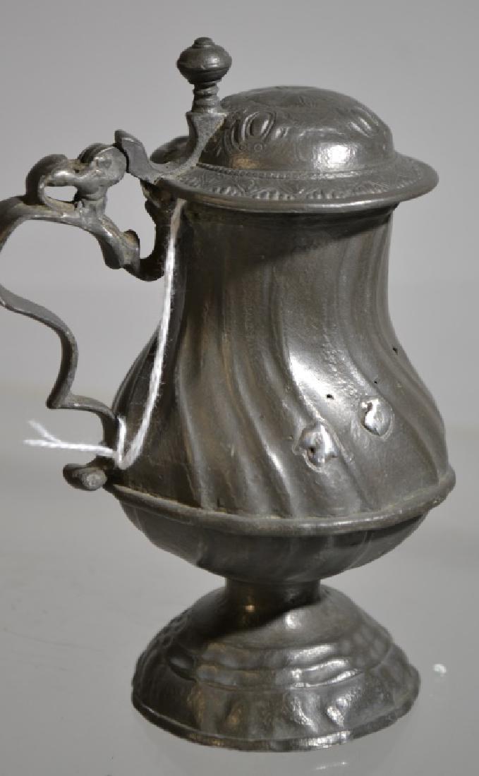 18thC German Rococo Form Lidded Tankard: 18thC German Rococo form Lidded Tankard with engraved and repousse decorated lid, circa 1775 standing appx 5.5"H