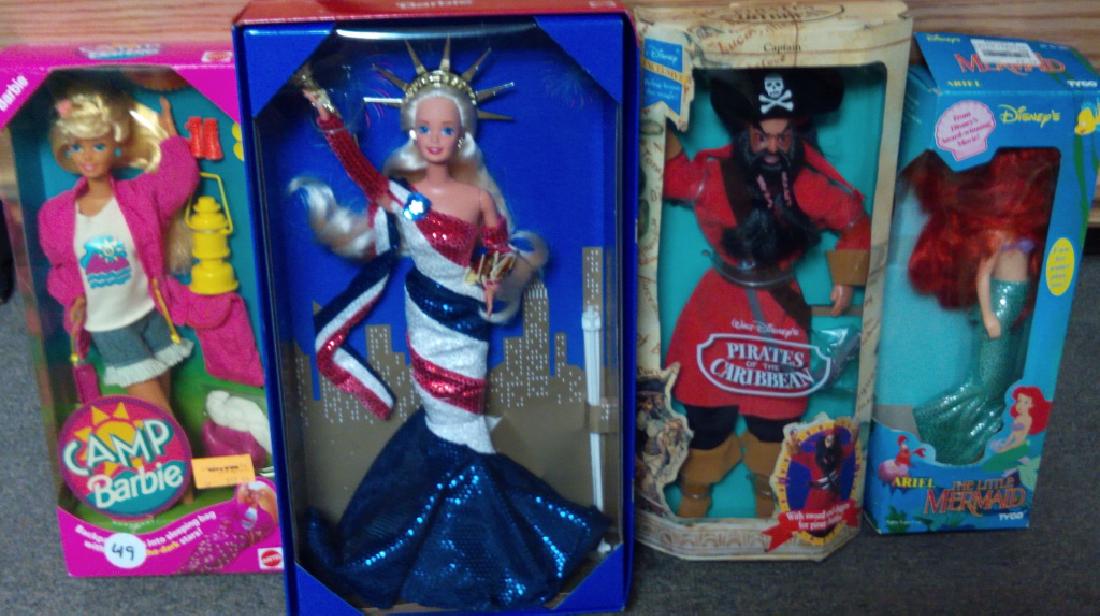 Disney and Barbie Collection: Collection includes; Statue of Liberty Barbie, Disney Pirates of the Carribean Captain Jack Sparrow, Disney Little Mermaid Ariel, and Camp Barbie