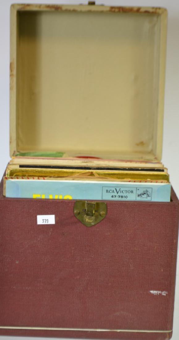 Large Grouping of 45's in Case: Large Grouping of 45's in Case, approx. 70% 45's in original sleeves, 2 red vinyl's including: Nat King Cole, Frank Sinatra, Elvis Presley, Jim Reeves, Della Reese 45's listed some are in fold sleeves