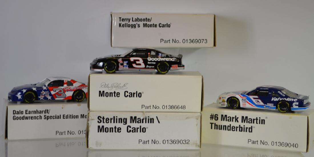 Grouping of Six Collectible Die Cast Cars: Grouping of Six Collectible Die Cast Cars NIB including: (1) Dale Earnhardt, (1) Sterling Marlin, (1) Terry Labonte, (1) Mark Martin. (all boxes have some staining and small indentations)