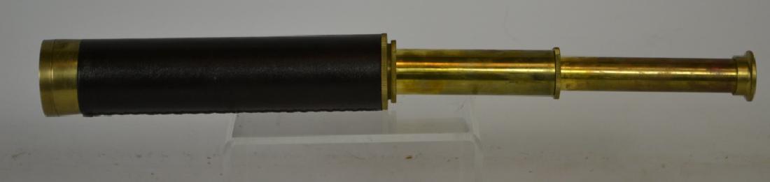 Brass Spyglass: Brass spyglass with 4 sections, measuring 18" extended, leather wrapped and sewn, no makers mark found, functional working condition with Brass lens cap