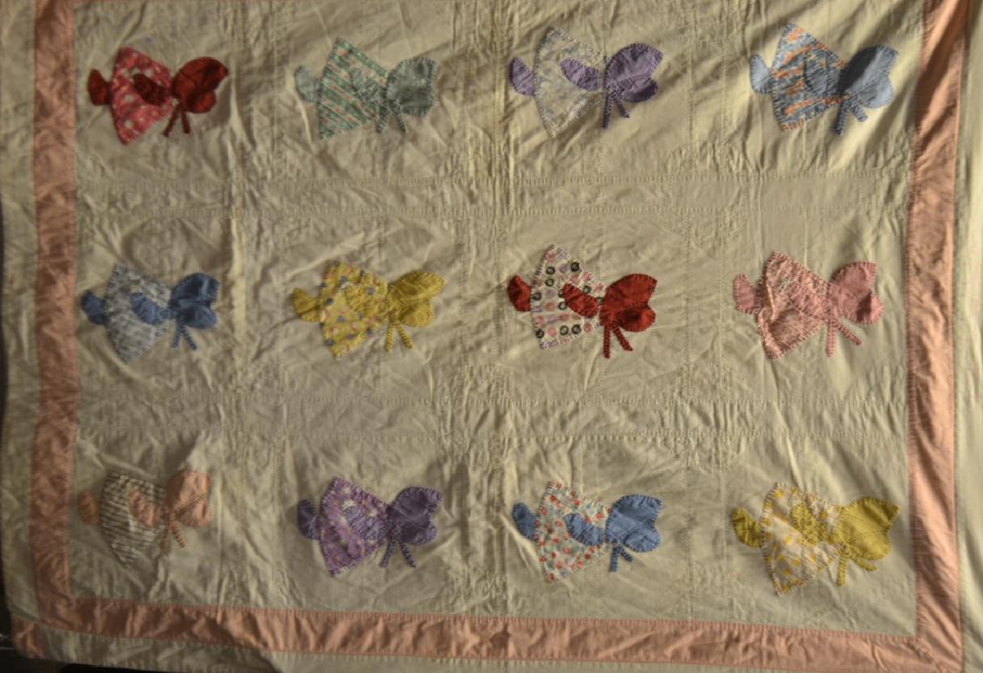 Vintage Sun Bonnet Sue Quilt: Vintage Sun Bonnet Sue Quilt, hand stitched child size, 12 Sun Bonnet Sues, measures approx. 56" x 42" (embroidered Donna Lee at top, dirt marks, like age staining)