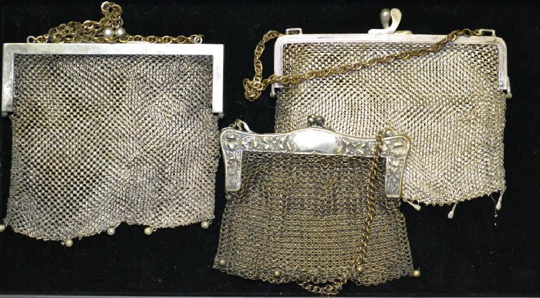 Grouping of Three Victorian Mesh Purses: Grouping of Three Victorian Mesh Purses including: German Silver Mesh Purse, measuring approx. 5.75" w double ball clasp and chain, 2nd German Silver , clasp and chain 3rd is German Silver by F. & Co.