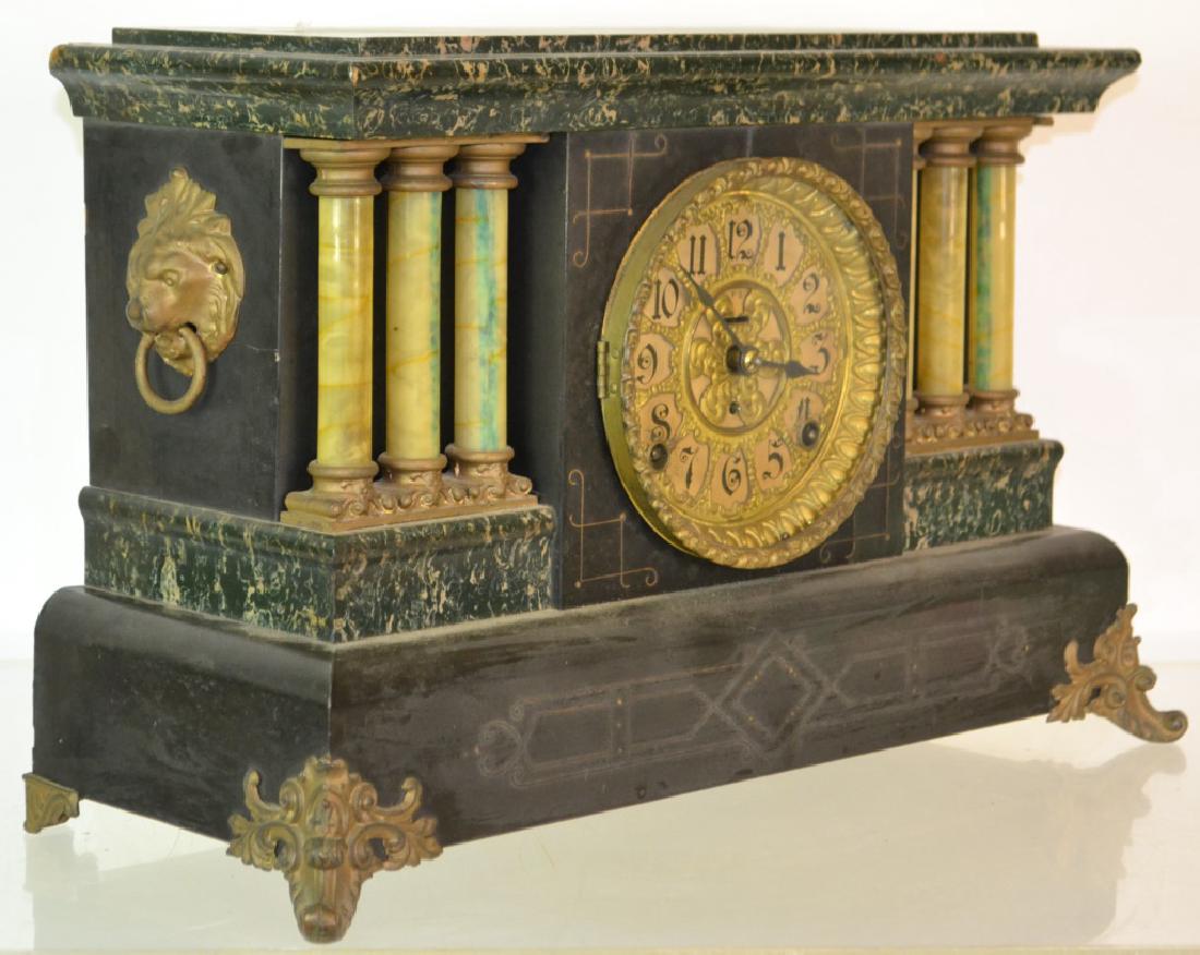 Antique Seth Thomas Mantle Clock: Antique Seth Thomas Mantle Clock marbleized wood body with key and pendulum and resting on brass feet